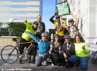 Photo of county employees and their bicycles.